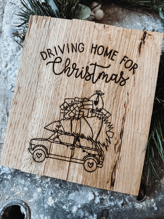 Holzschild „driving home for christmas“